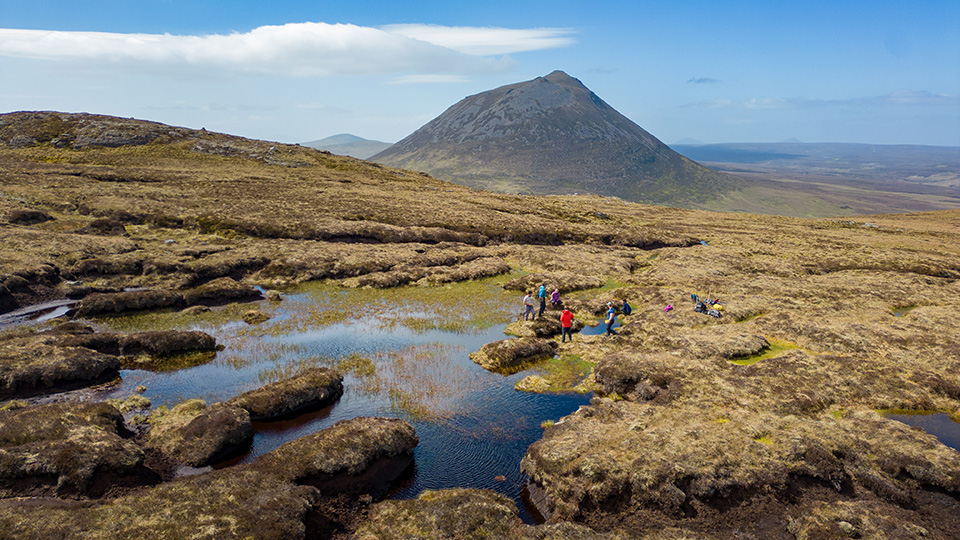 Aerial view of researchers in peat lands Aerial view of researchers in peat lands